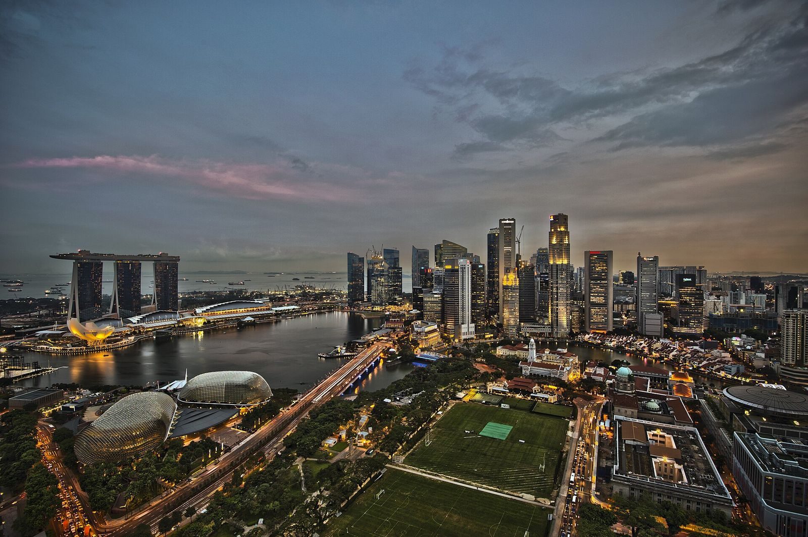 The Singapore skyline at dusk, towers of the Marina Bay financial district