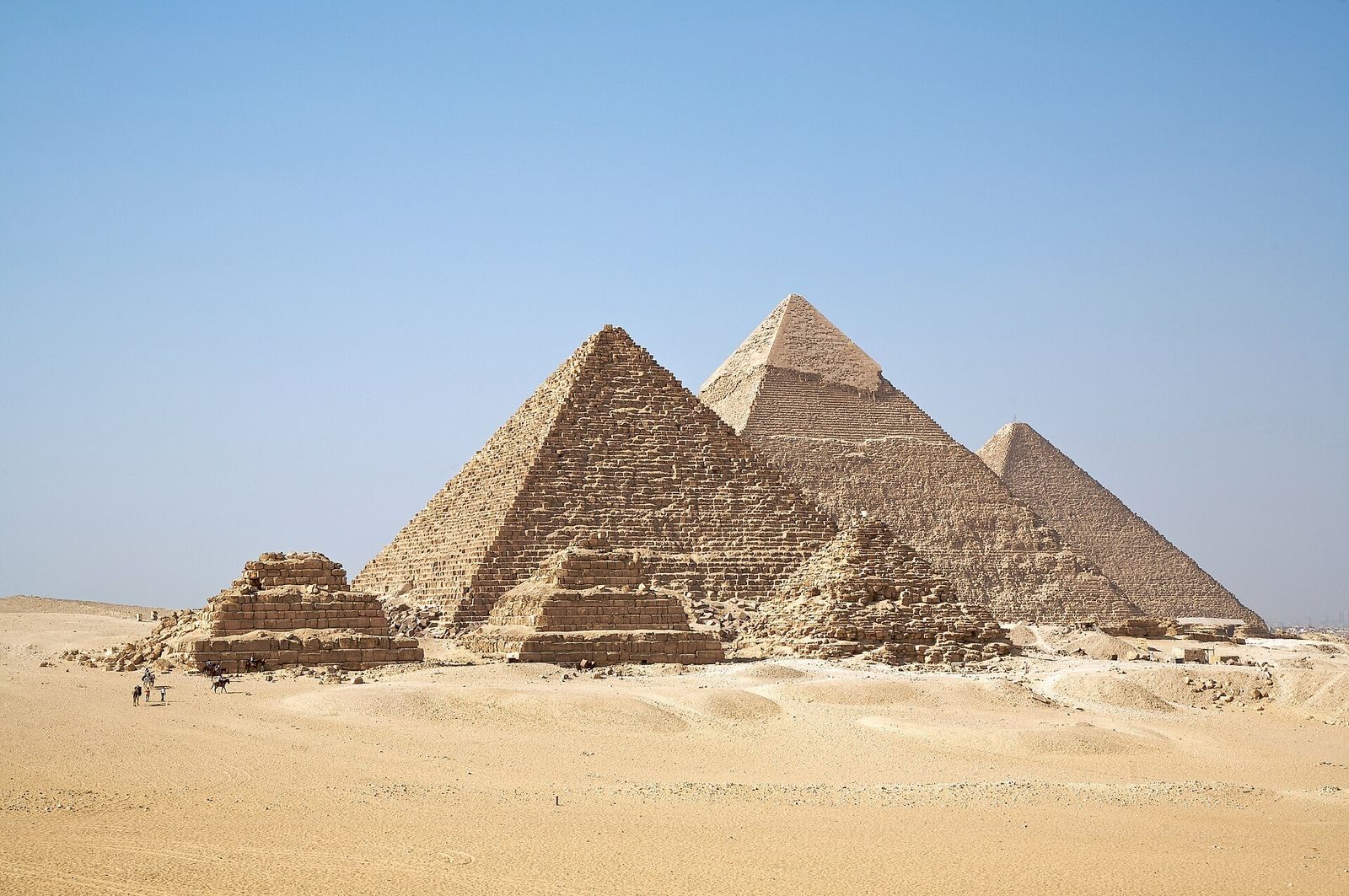 The pyramids of Giza under a desert sky