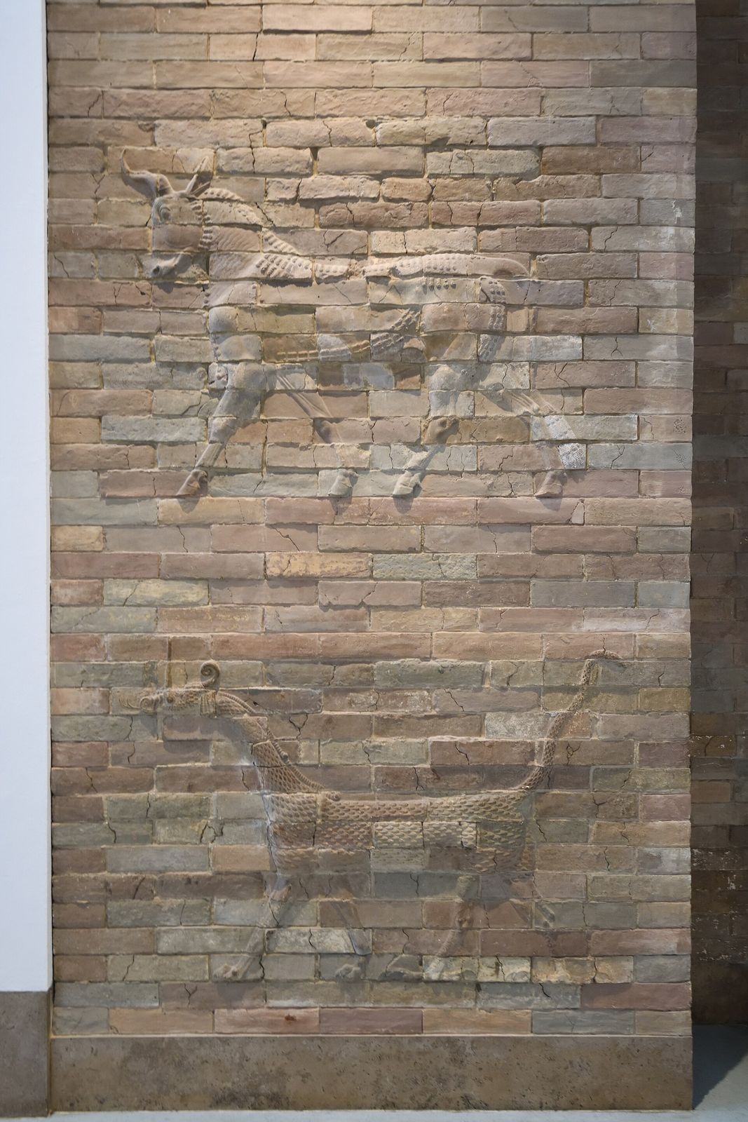 The reconstructed Ishtar Gate of Babylon, its glazed bricks glowing blue