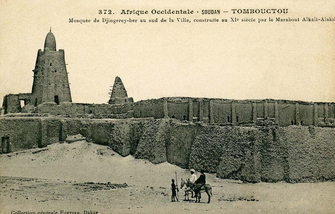 The Djinguereber Mosque in Timbuktu on an early-1900s postcard — built under the Mali emperor Mansa Musa around 1327