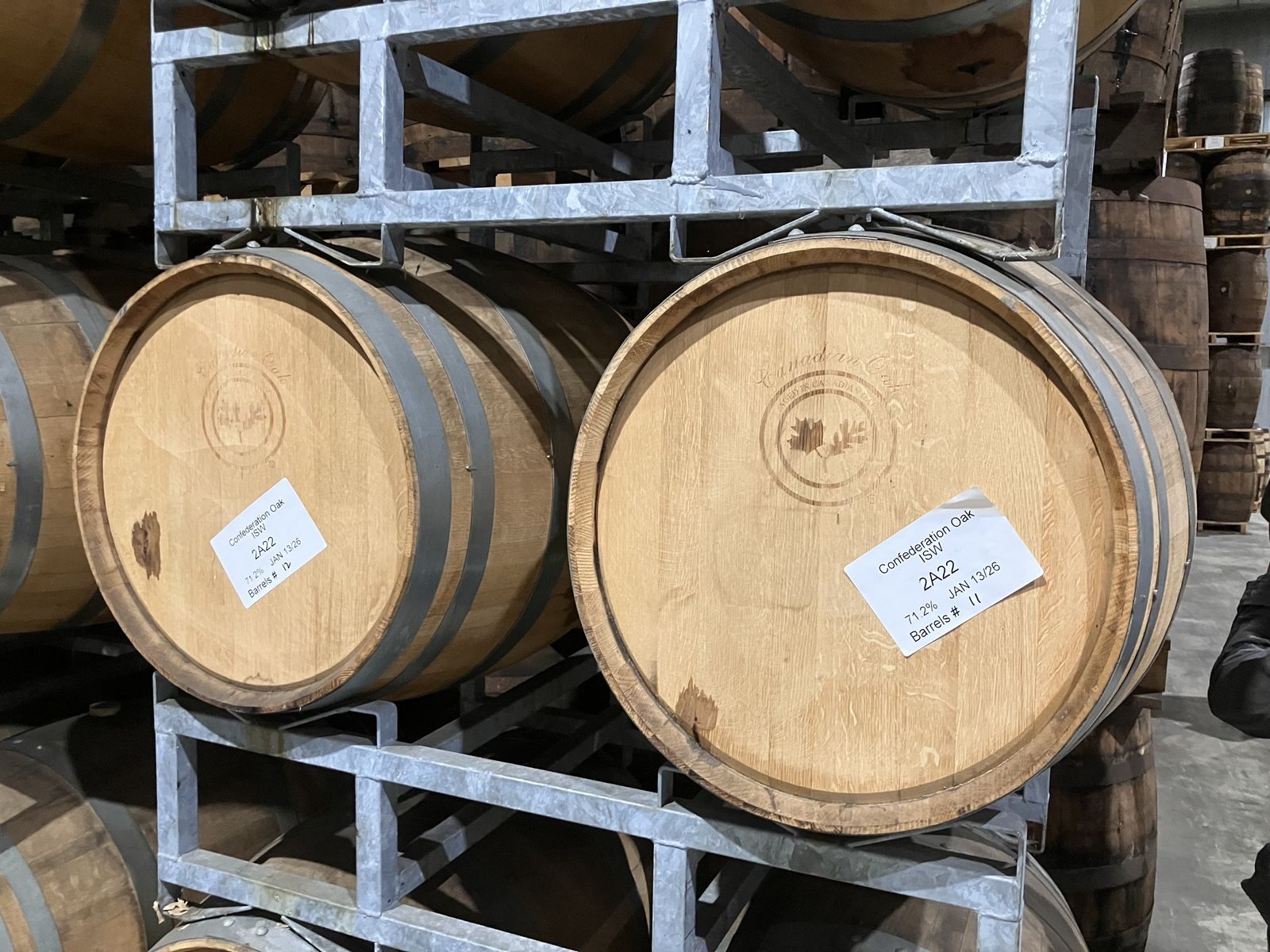 Whisky barrels aging inside a Canadian distillery
