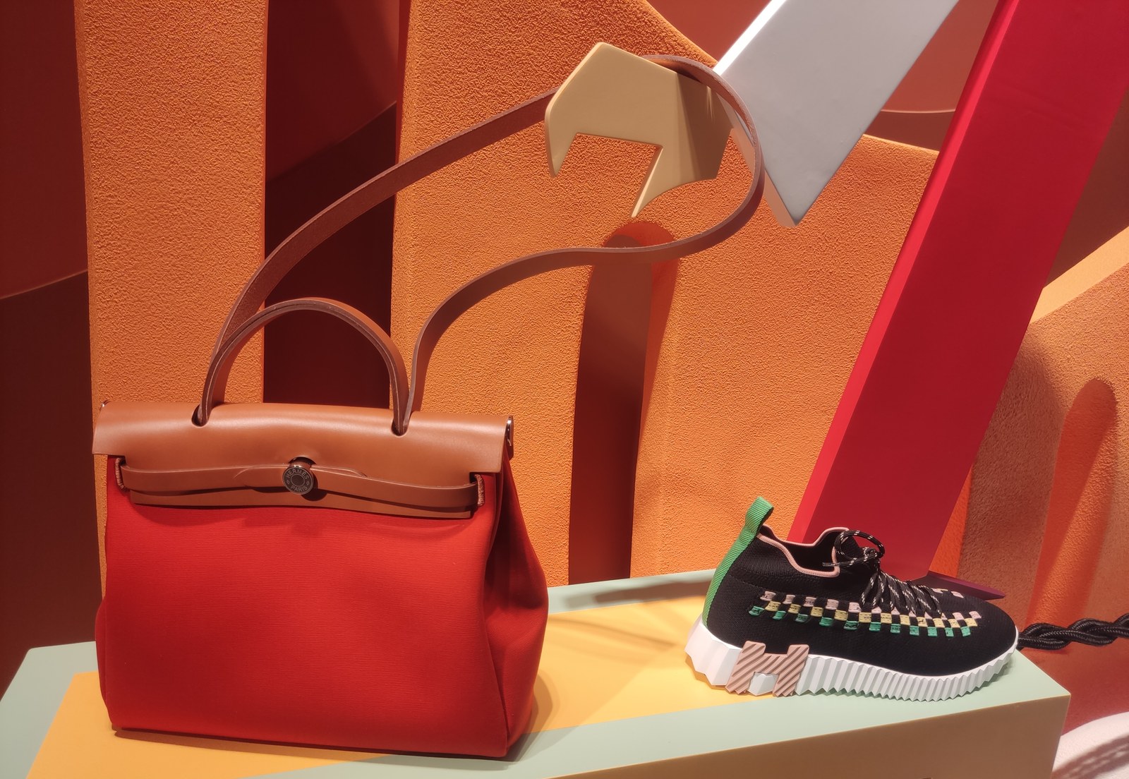 A luxury handbag displayed in a boutique window in Tsim Sha Tsui, Hong Kong — China's aspirational luxury market is shifting toward pre-owned