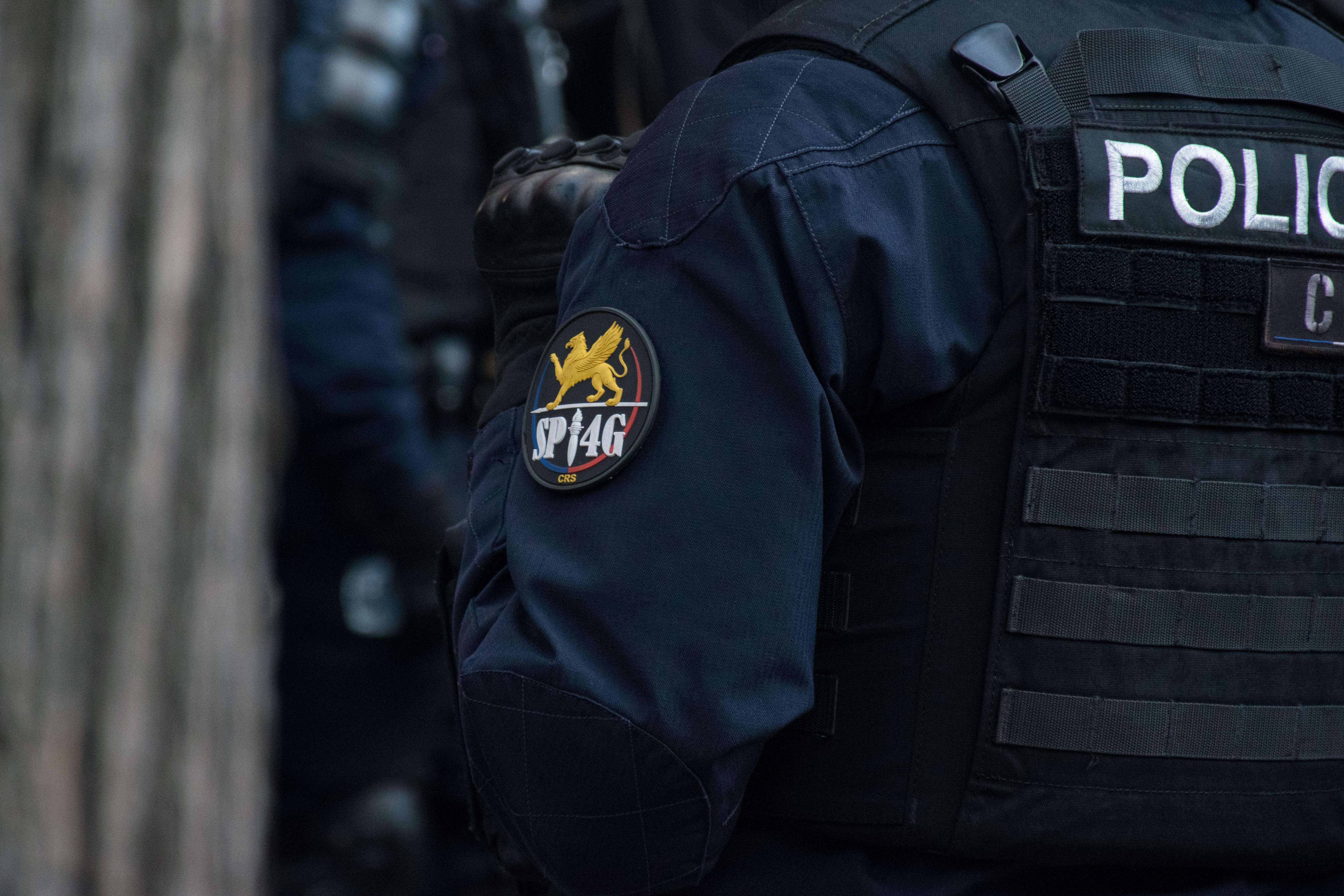 Student demonstrators march in Paris on 6 October 2026 between Republique and Nation, with CRS riot police alongside, during the nationwide French high-school protests
