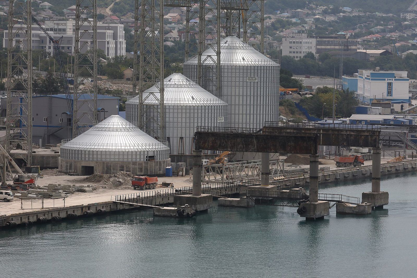 Grain silos at the KSK export terminal on the Black Sea — the steel-and-concrete hardware of the grain corridor