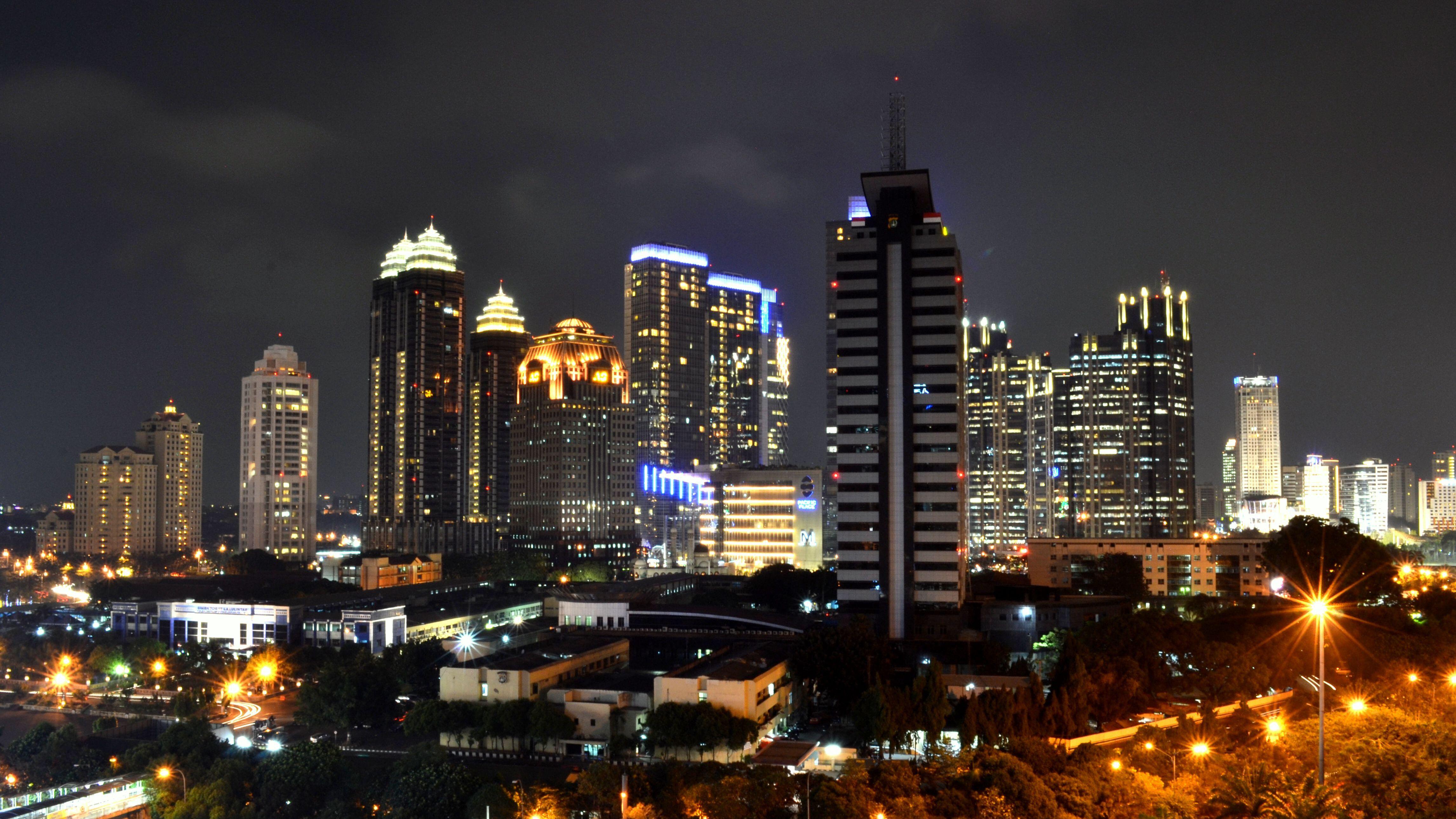 Jakarta's Sudirman Central Business District financial skyline at night — the capital's financial heart, home to the Indonesia Stock Exchange